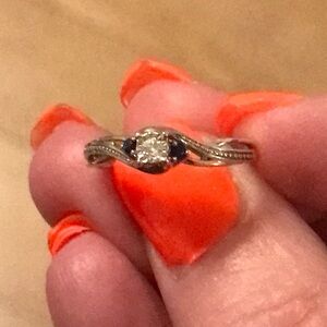 Sterling silver diamond ring.